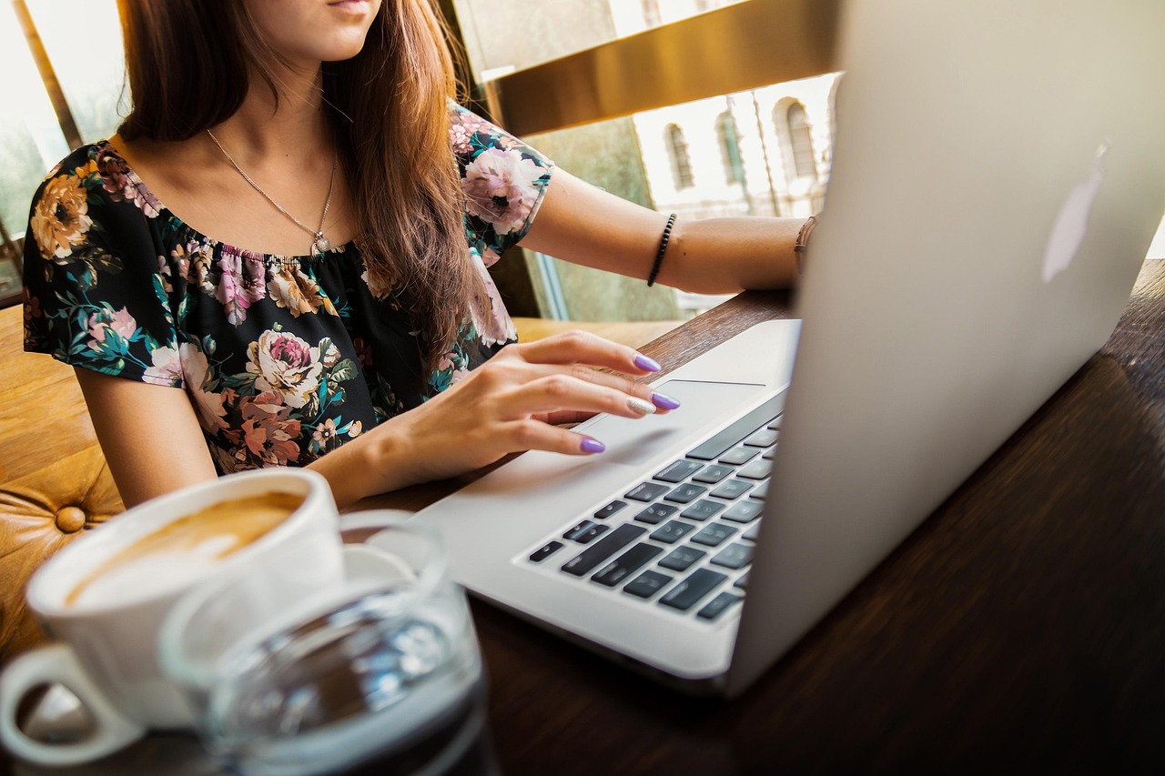 woman, laptop, desk, workspace, coffee cup, macbook, technology, work, working, working woman, coffee, computer, cup, girl, mug